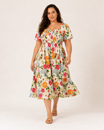 Elena Kleid – Sommerkleid aus Baumwolle mit Blumenmuster, eckigem Ausschnitt und Taschen