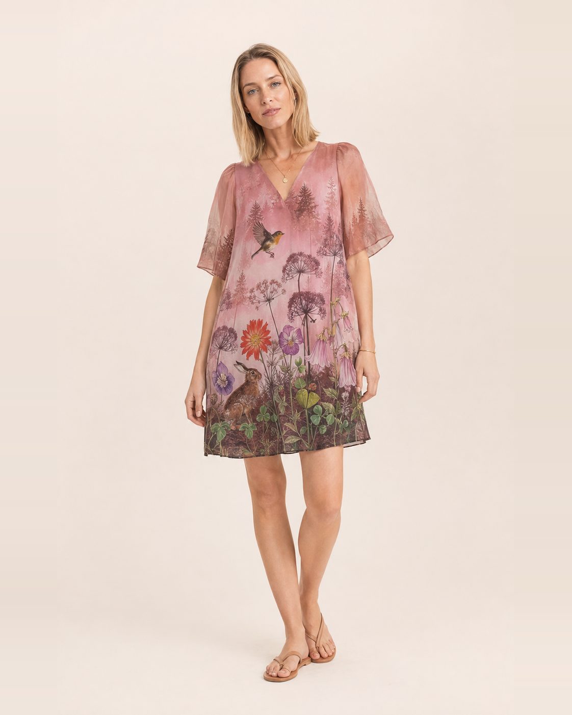Abito Lena – abito corto a tunica in voile con stampa bosco rosa, fiori e animali